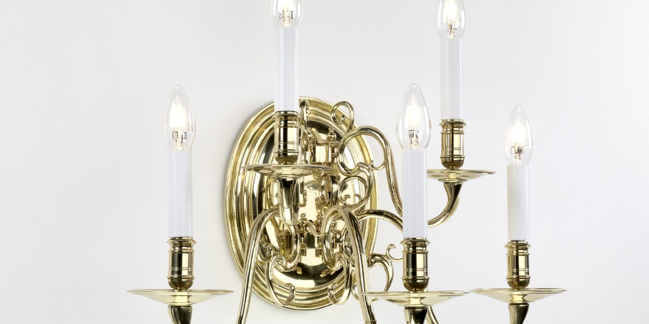 9_10_05-flamischer_barockwandleuchter_5_arme_auf_gegossenem_wandschild___b_ca._50_cm.__cm_messingguss_hochglanz_poliert